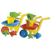 Colorful wheelbarrows with yellow buckets, green shovels, orange and red wheels, and marine-themed molds.