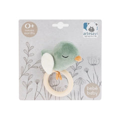 Soft green bird plush rattle with white wings and orange beak on decorative packaging, suitable for newborns.