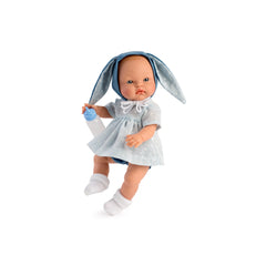ASI Dolls Alex Bunny Doll in a light blue polka dot dress with bunny ears, holding a baby bottle.