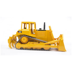 Yellow Bruder CAT Bulldozer toy with adjustable blades and rubberized tracks, side view.