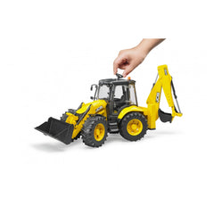 Yellow and black Bruder JCB 5CX eco Backhoe Loader toy with moving parts, including front and rear buckets, held by a hand.