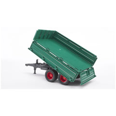 Green tipping trailer with red wheels and removable top, raised in a tipping position on a white background.