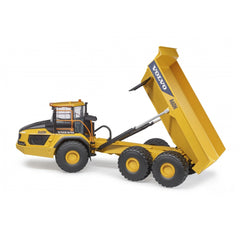 Yellow Volvo Hauler A60H toy with articulated dumper and oversized tires, showcasing realistic construction vehicle details.