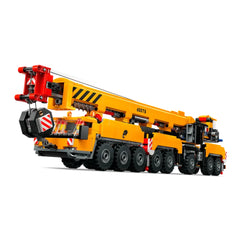 LEGO® City Mobile Construction Crane set in vibrant yellow, showcasing a detailed 16-wheel truck that transforms into a towering crane with realistic features, including a functional hoist and moving parts.