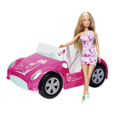 A doll named Steffi Love sitting next to a pink convertible car with white and lighter pink detailing. Steffi Love is wearing a floral dress.