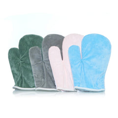 Four soft thermal anti-colic gloves in green, grey, pink, and blue, neatly arranged side by side.