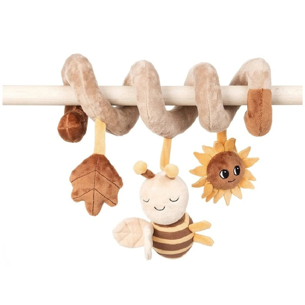 Adorable spiral bee plush rattle with a smiling bee, sun, and leaf hangs from a beige spiral on a wooden bar.
