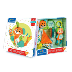 Baby gift set packaging features a cheerful puppy character with vibrant colors and a clear window showcasing the toys inside
