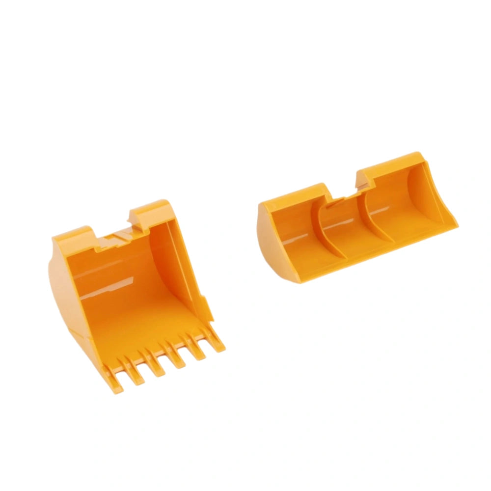 Yellow plastic toy excavator buckets on white background.