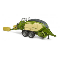 Bruder Krone BiG Pack 1290HDP VC toy baler with green and beige design, includes 2 block hay bales.