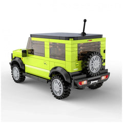 CaDA Suzuki Jimny construction set toy in yellow with black roof, bumpers, and roof rack; features clear plastic windows.