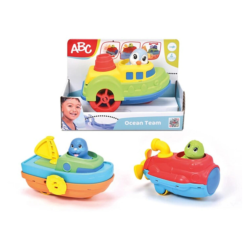 Dickie Abc Ocean Team bath toy boat with blue and red body, green top, and yellow wheel, packaged in white box with labels.