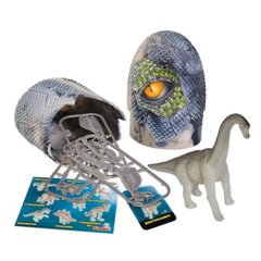 Dinosaur egg figure surrounded by a large textured mask and a smaller mask, all featuring dinosaur-themed patterns.