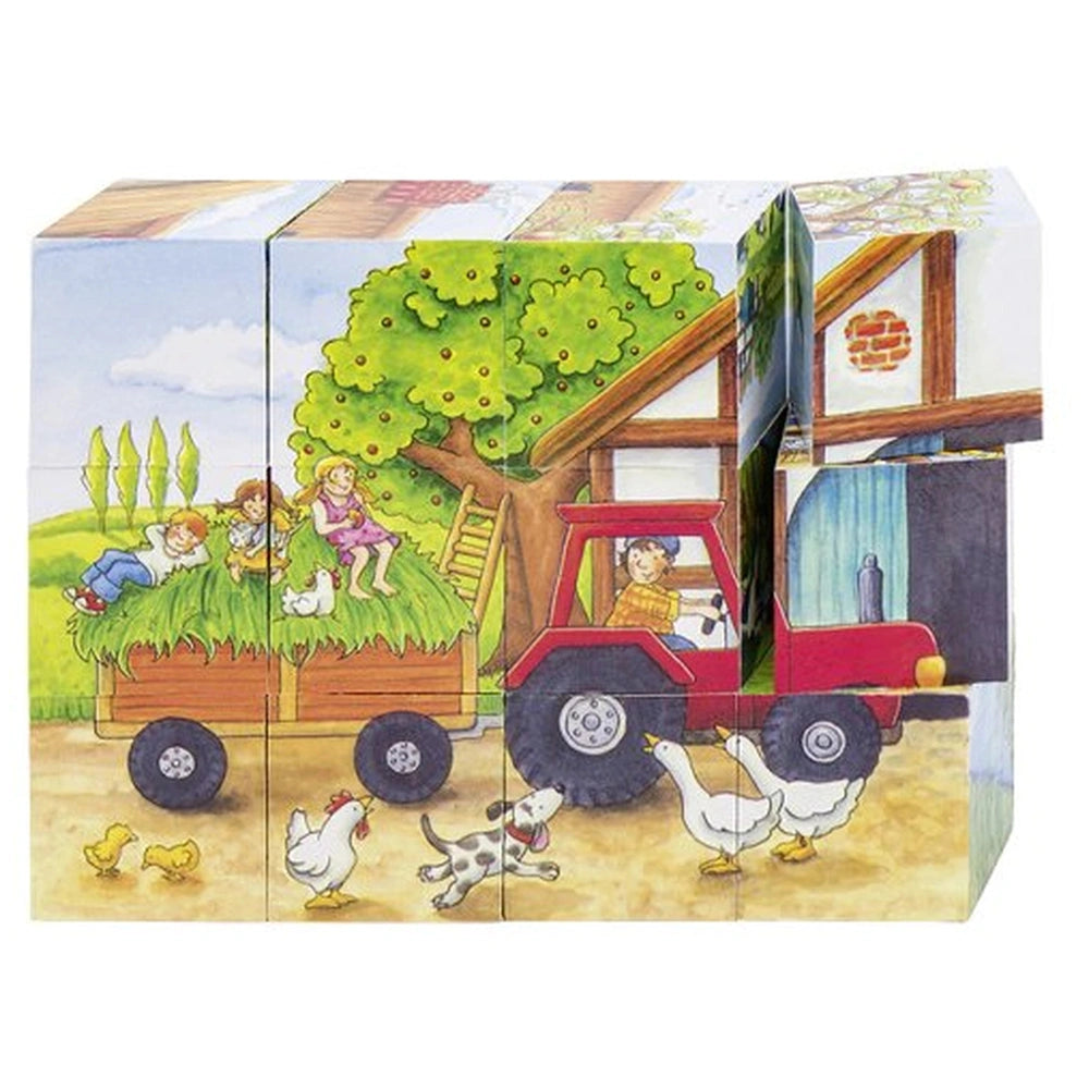 Gollness Cube Puzzle Seasons On The Farm features a glossy cardboard package with a family on hay, a red truck, and two chick