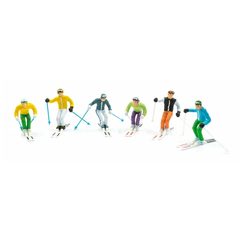 Jagerndorfer model features six standing figures in jackets, skis, and helmets on a light surface, showcasing vibrant colors.