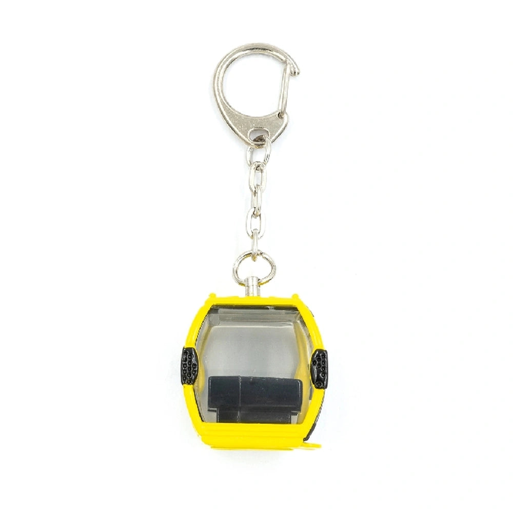 Yellow Jagerndorfer Omega IV gondola keychain made of plastic with a clear window and silver metal ring.