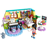 LEGO Friends Paisley’s Room construction set featuring two minidolls, vibrant decor, a keyboard, and a pet bunny, inviting creative play.