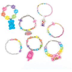 Pop Shake Twist Bracelet Set featuring colorful plastic bracelets with bear-shaped charms and visible beads.