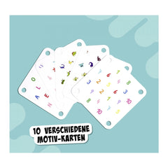 Noris My Frog Memory Game featuring white plastic tags with designs and numbers on a light blue background.