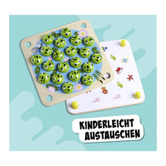 Noris My Frog Memory Game featuring colorful frog figurines on a playful blue board with cut-out shapes.