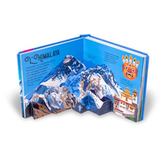 NUINUI Montagna Sorprendenti Pop Up book with glossy blue cover, white text "L'Himalaya," and vibrant mountain illustrations.