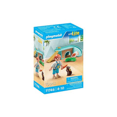 PLAYMOBIL Guinea Pig House toy playset packaging features a blue background, clear plastic window, and a boy figurine with a