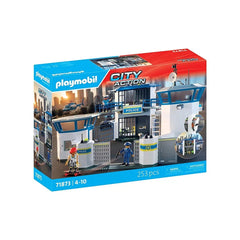 Playmobil Police Command Center toy playset in red cardboard packaging with clear window, featuring police station, car, offi