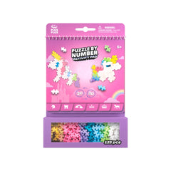 Plus Plus Fairytale Activity Pad packaging featuring a pink background, glossy finish, puzzle, stickers, and clear window.