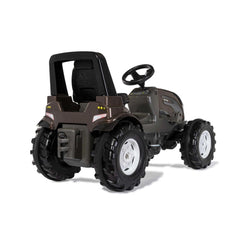 ROLLEY TOYS rollyFarmtrac Premium II Valtra is a dark, four-wheeled toy vehicle designed to resemble a utility tractor.