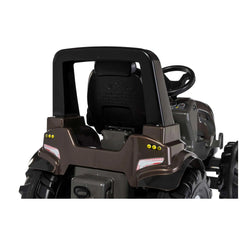 ROLLEY TOYS rollyFarmtrac Premium II Valtra is a matte black off-road vehicle with brown accents and safety features.