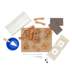 Teifoc water mill set featuring wooden blocks, metal gears, and tools arranged on a flat surface for arts and crafts.