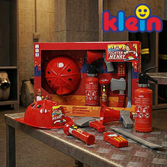 Theo Klein firefighter set in a red cardboard box features plastic fire engine, helmet, hose, extinguisher, and accessories.