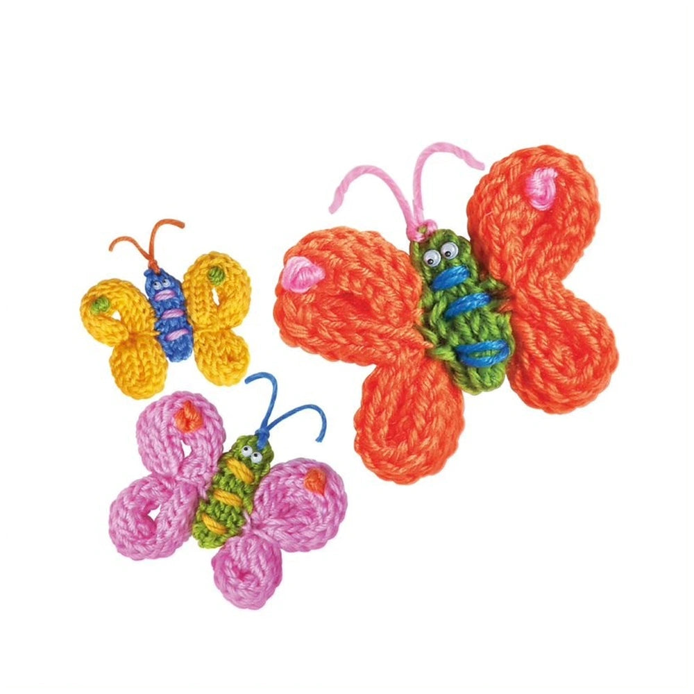 4M French Knit Butterfly Kit featuring three yarn butterflies with colorful wings, pipe cleaner antennae, and bead eyes.