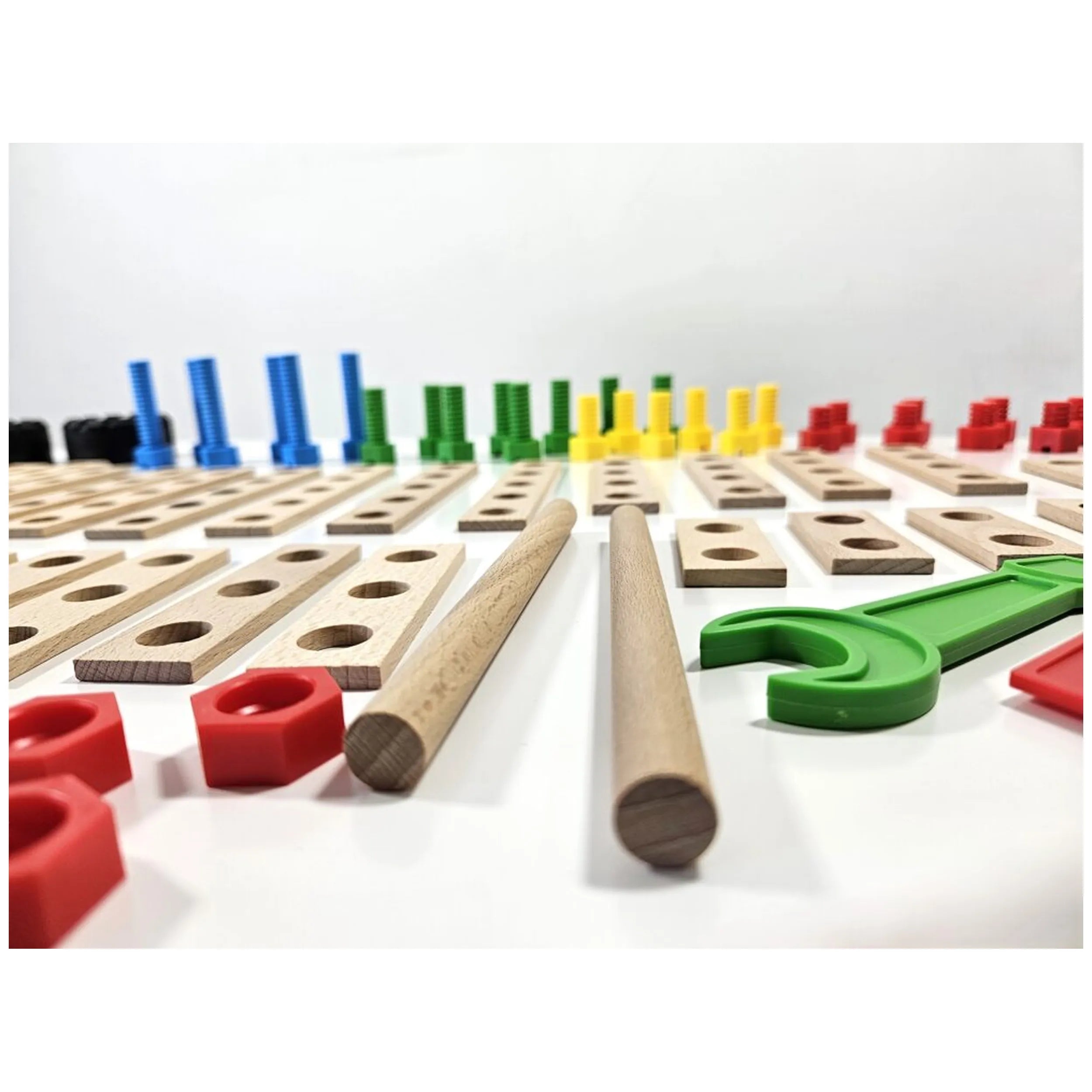Colorful construction set with wooden beams, vibrant screws, and connectors from the Alexander Maly Constructor Junior 3X1.