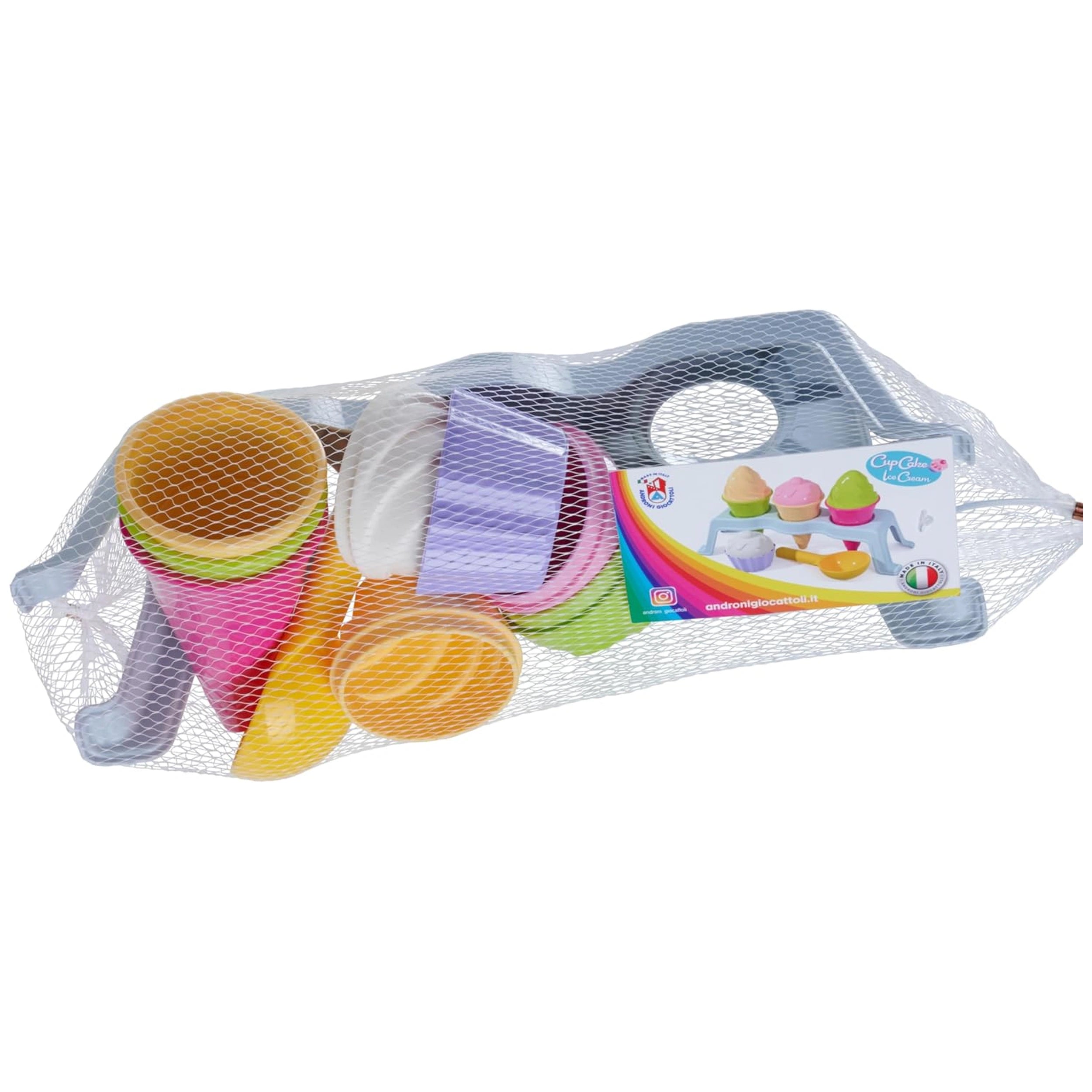 Colorful Androni Ice Cream Stand set in a net bag, featuring pink, yellow cones, white and purple accessories, packaged for kids.