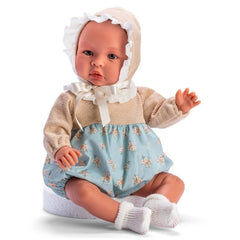 Asi Dolls - Leo, 46 cm, in bloomers with a blue and orange floral pattern, tan bonnet, and white socks.