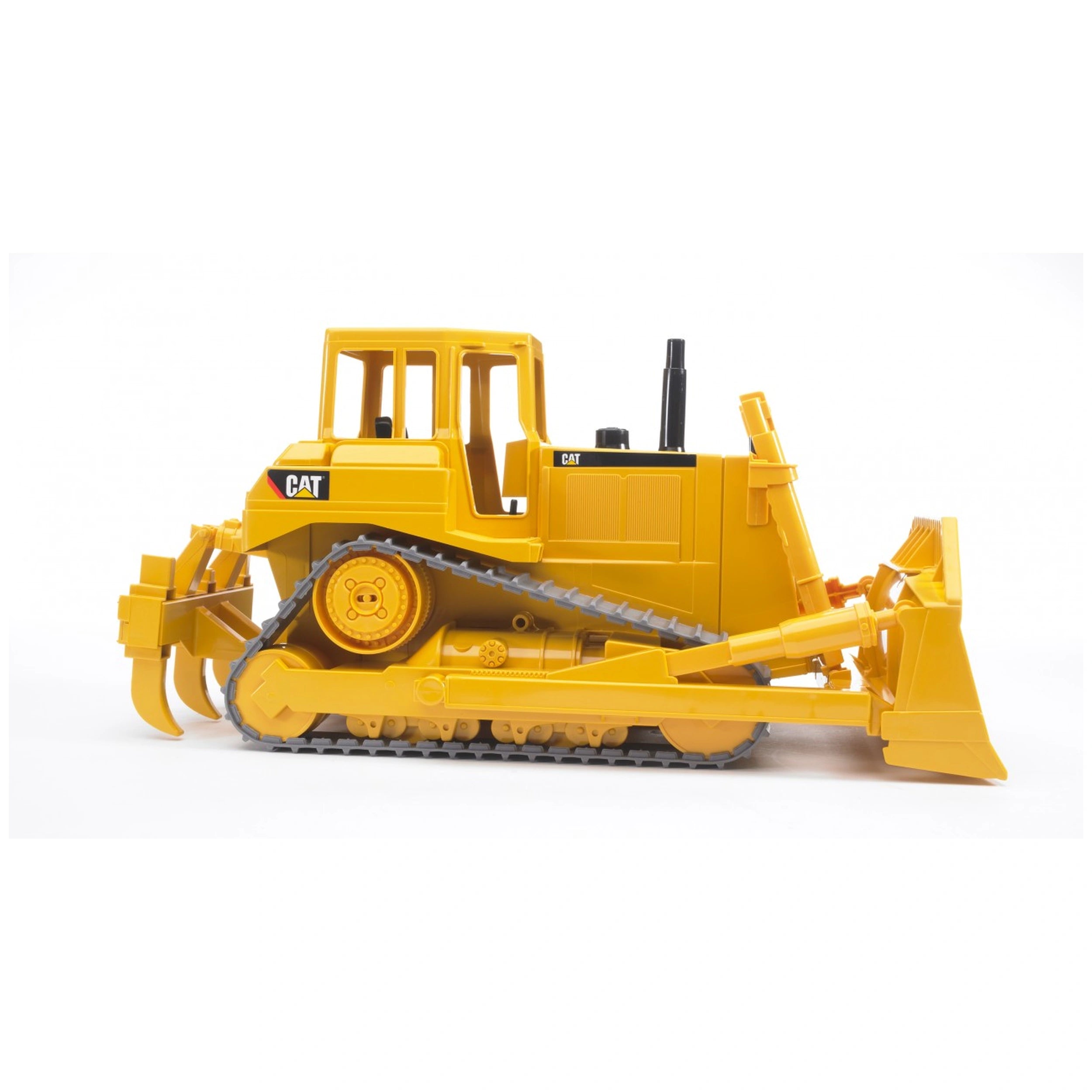 Yellow Bruder CAT Bulldozer toy with adjustable blades and rubberized tracks, side view.