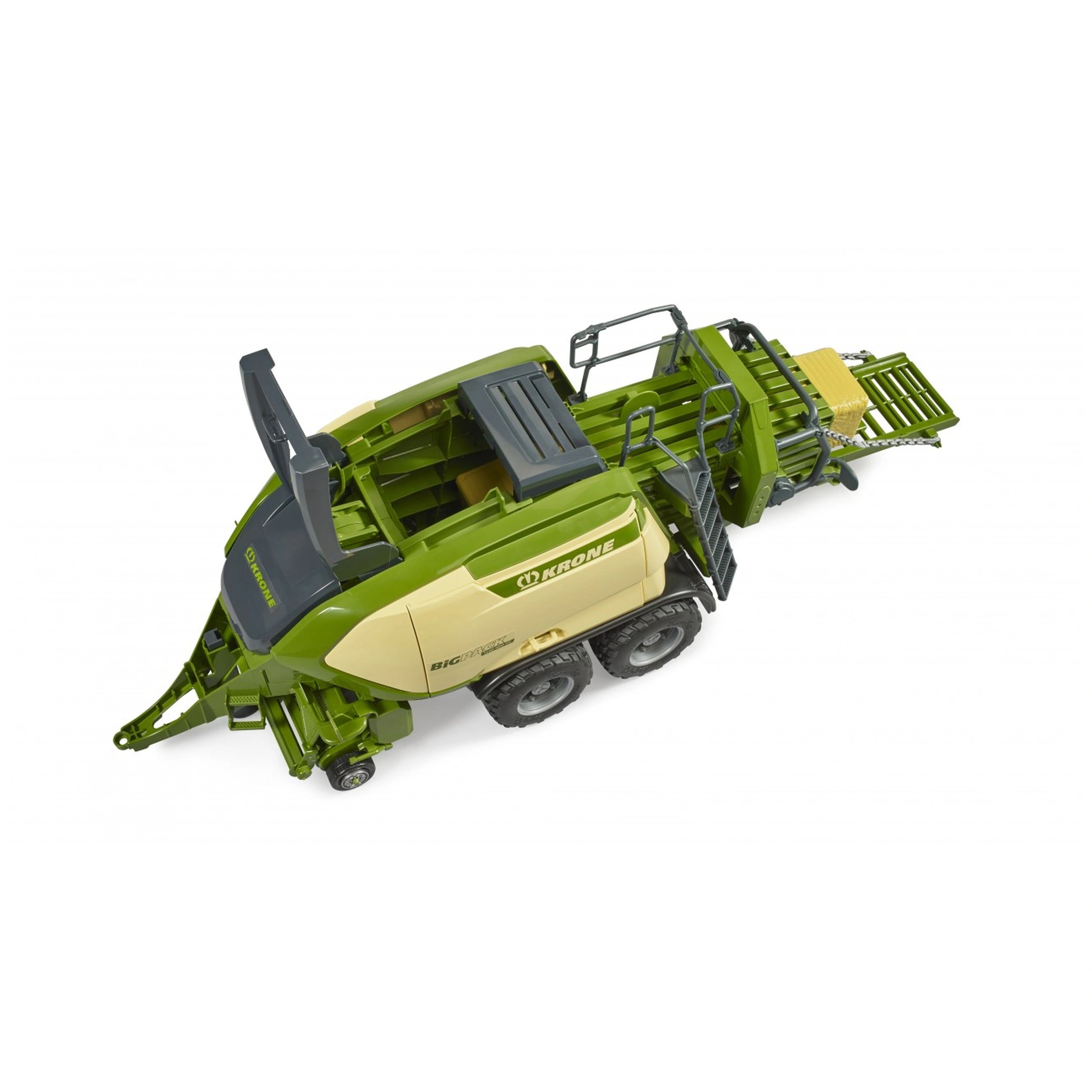 Bruder Krone Big Pack 1290HDP toy baler with green and beige body, foldable pick-up, and two hay bales.