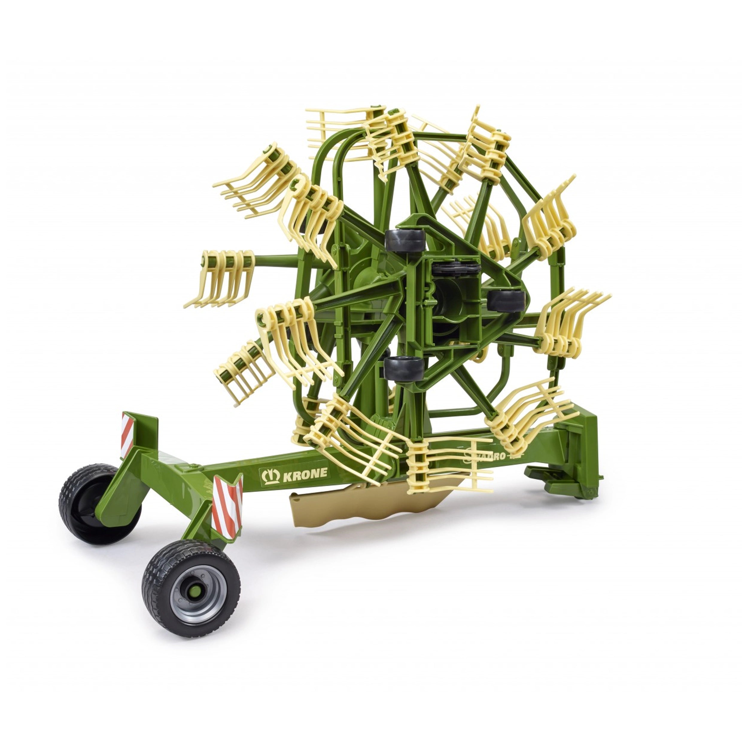 Green and yellow Bruder Krone dual rotary swath windrower toy with detailed spinning mechanism.