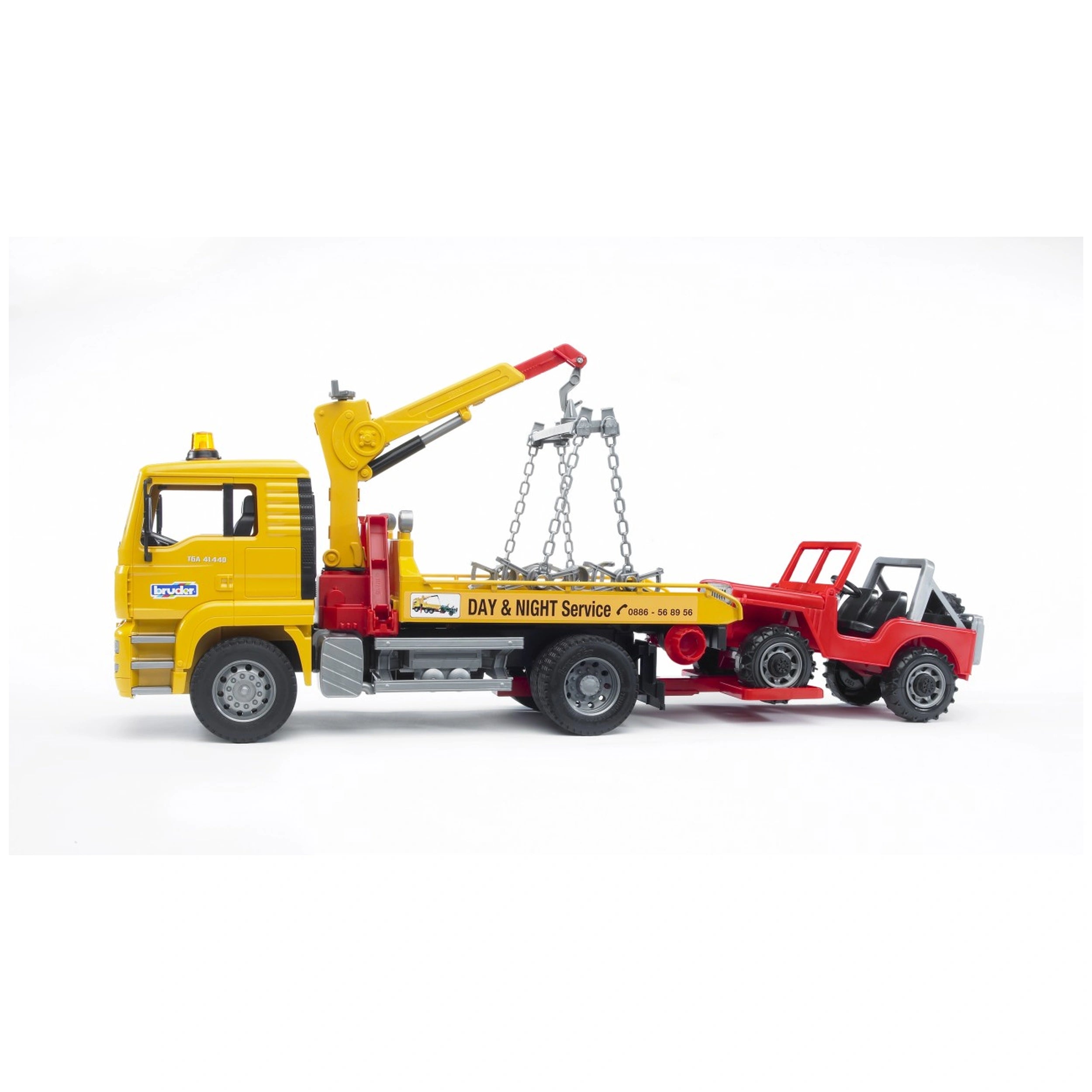 Yellow toy breakdown truck towing a red cross-country vehicle, featuring a crane with chains for rescue play scenarios.