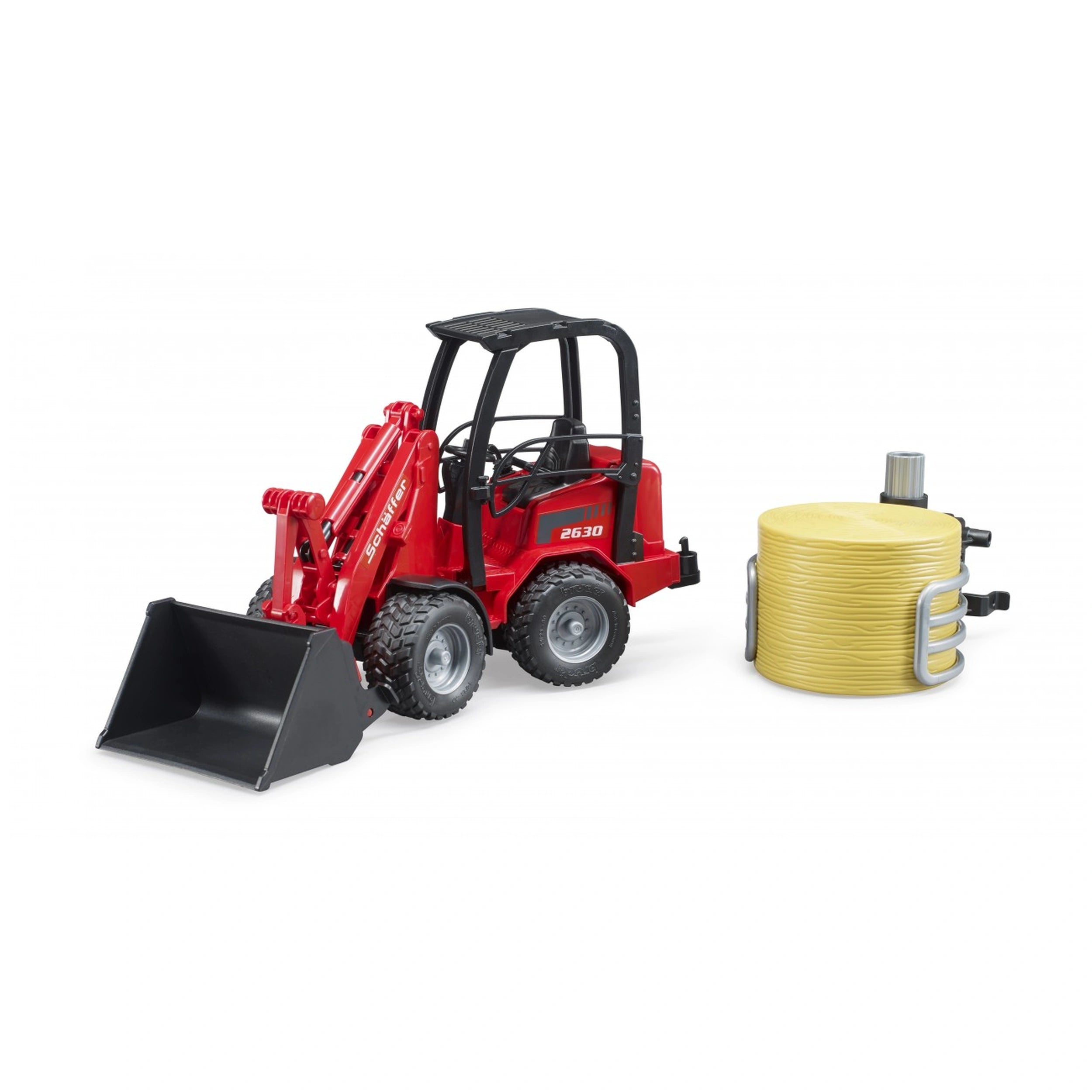 Red Bruder Schäffer Compact Loader 2630 with bale gripper and yellow bale, featuring realistic details and sturdy design.