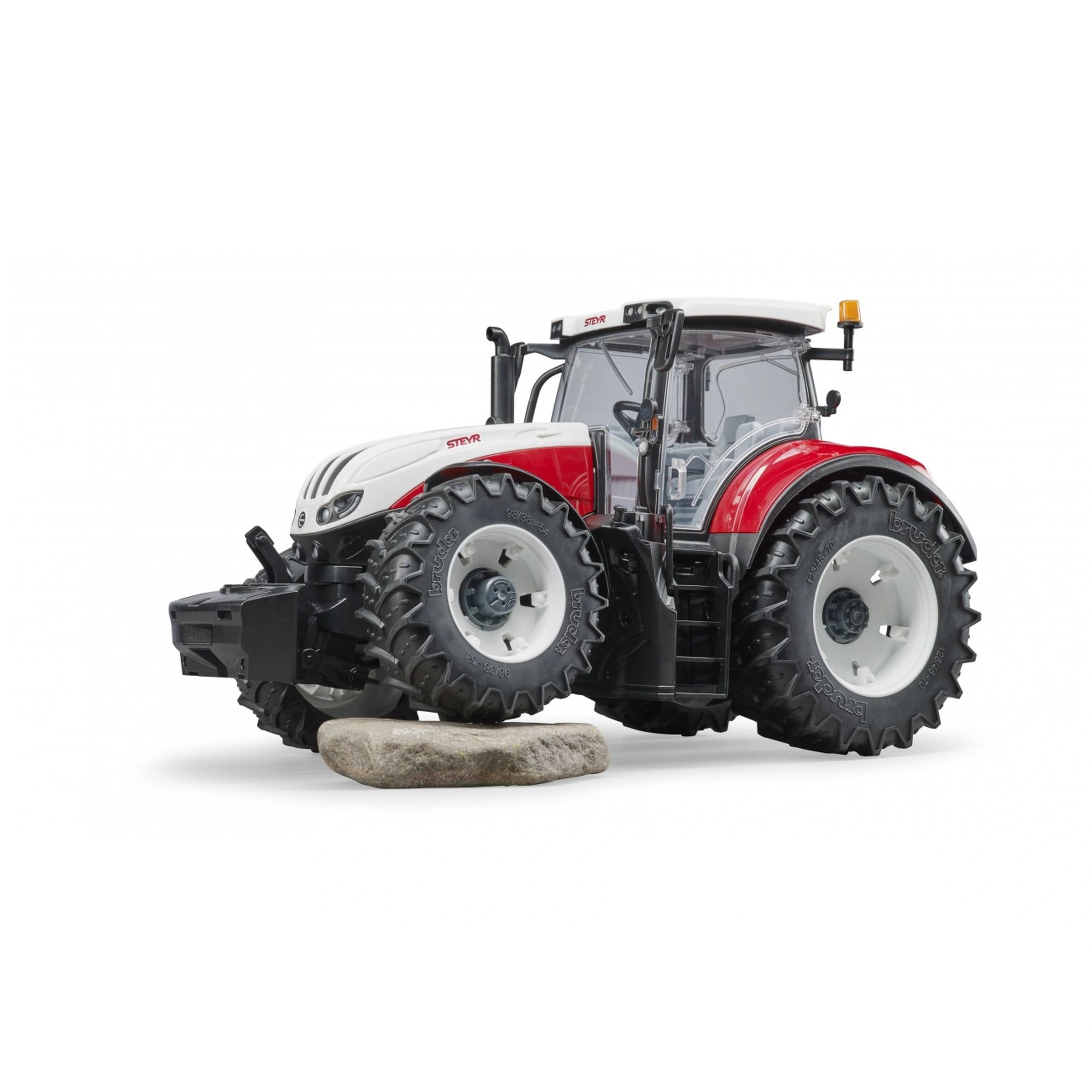 Bruder Steyr 6300 Terrus CVT toy tractor with detailed cabin and large tires on a white background.