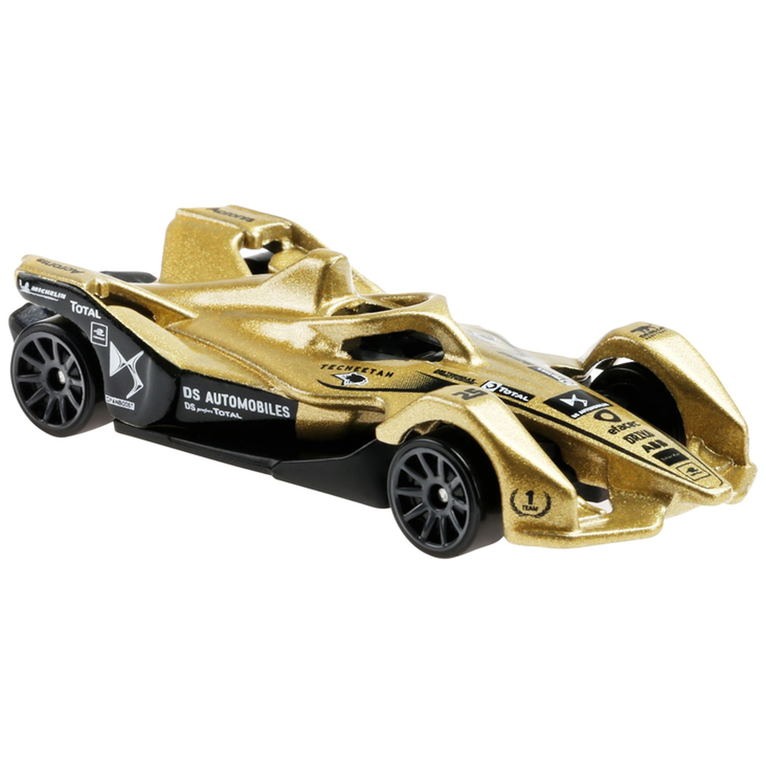 Gold-colored Hot Wheels die cast vehicle with black wheels and clear window, featuring "DS AUTOMOBILES" and logo details.