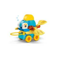Colorful LEGO construction set representing a fish on wheels, featuring yellow fins, a smiling face, and a sturdy base for imaginative play.