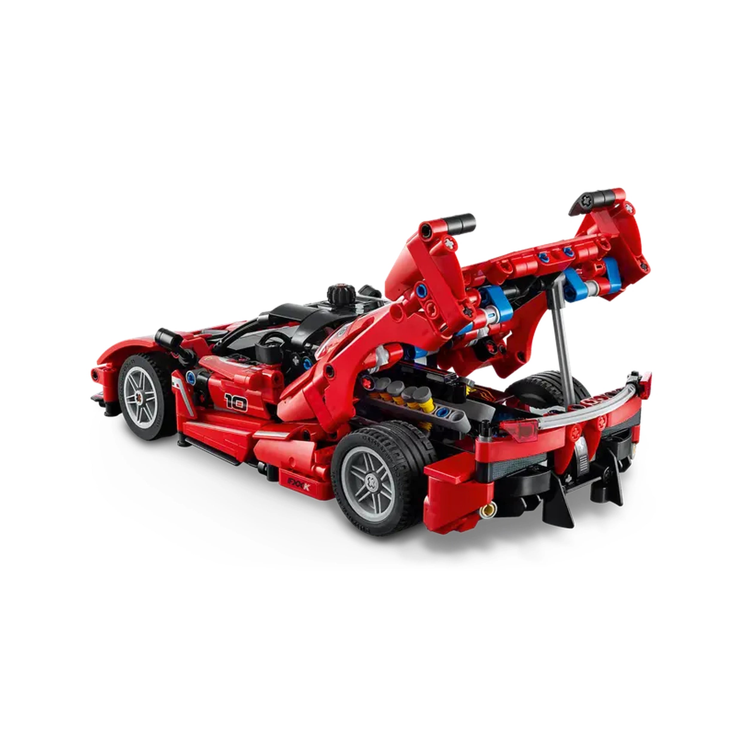 Red LEGO® Ferrari FXX K model with butterfly doors open, showcasing a detailed engine and vibrant design, viewed from the rear angle.
