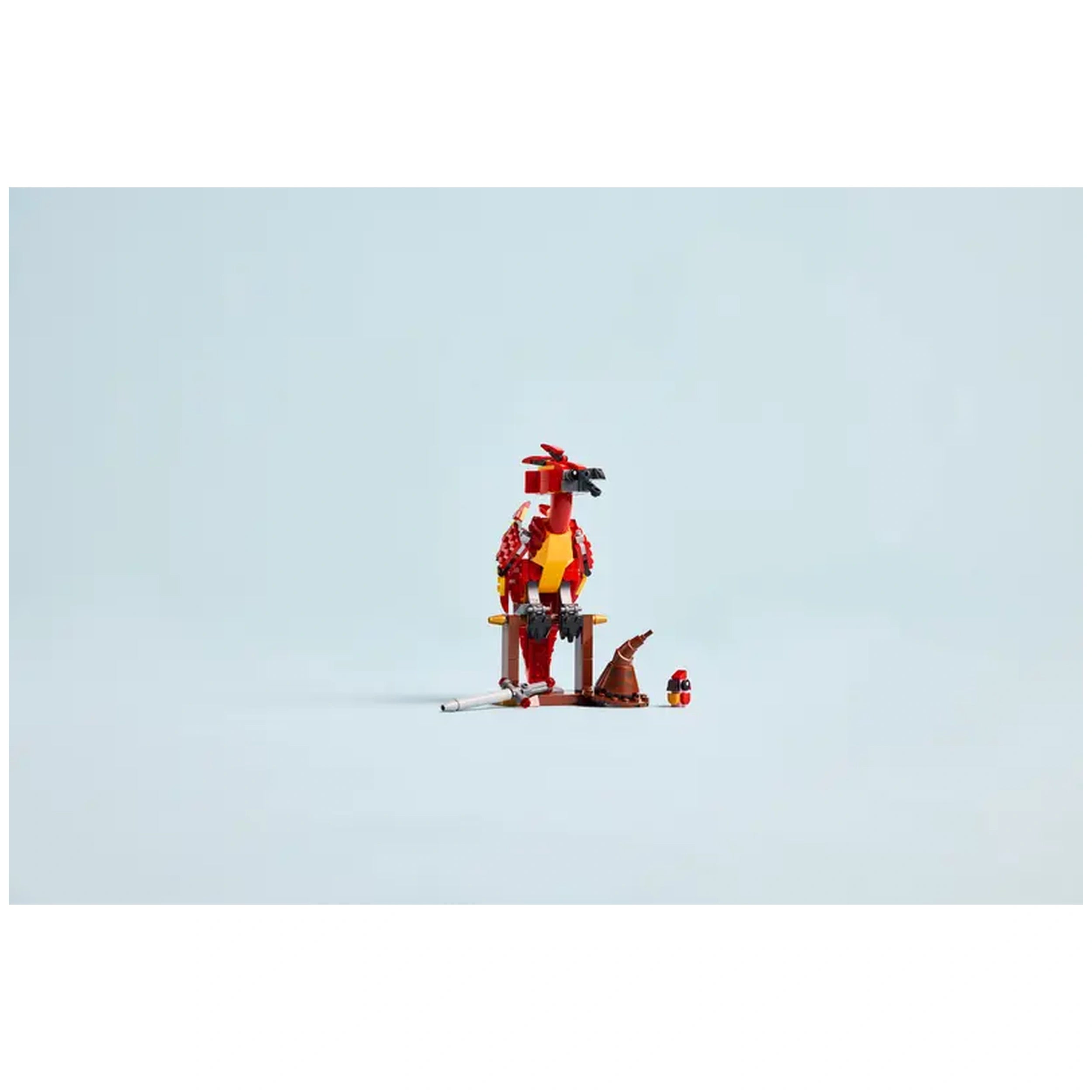 LEGO Harry Potter Fawkes the Phoenix construction set, featuring a vibrant red and yellow phoenix figure, buildable stand, Sword of Gryffindor, and a baby Fawkes figure.