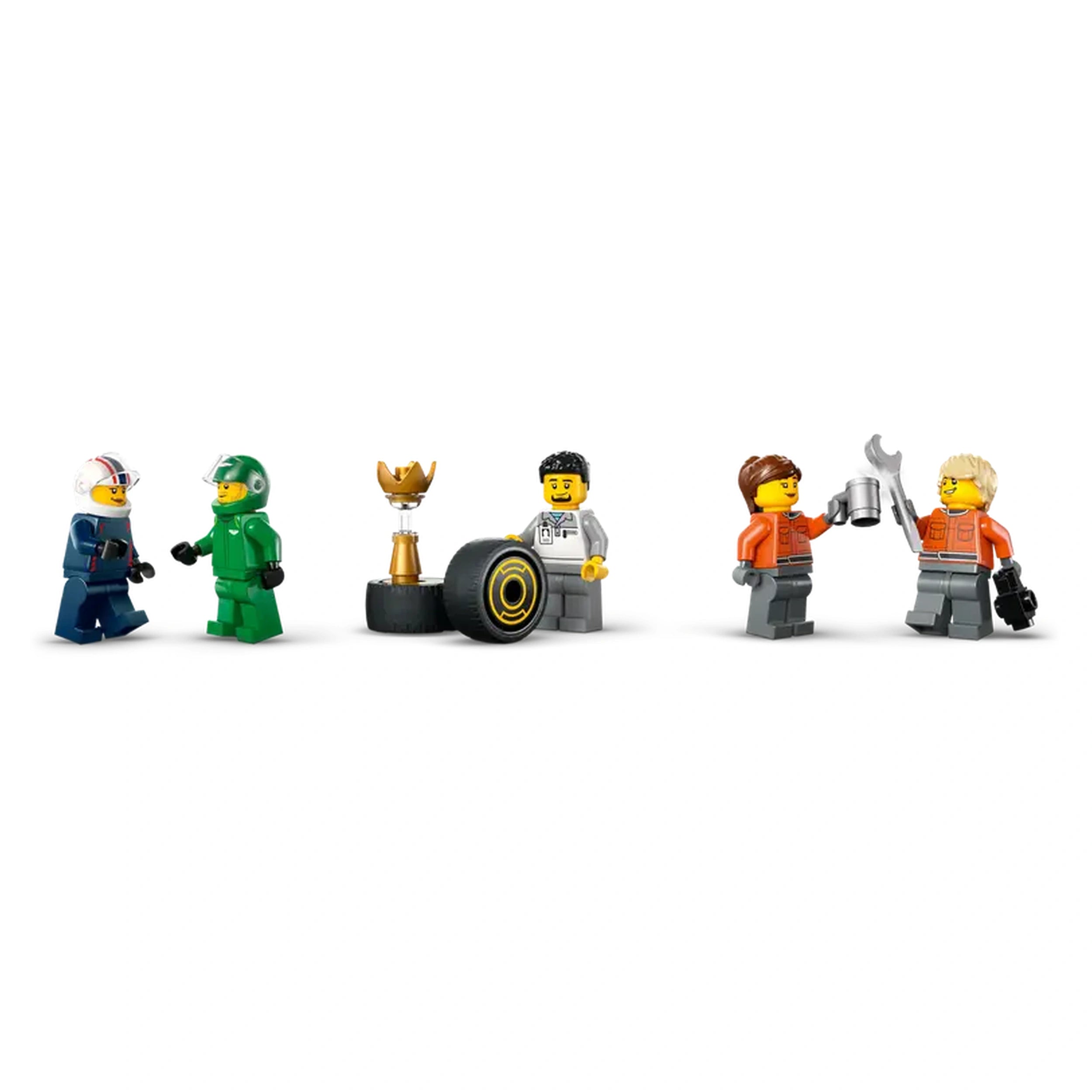 Four LEGO® mini-figures celebrate a racing victory. Two in helmets converse beside a trophy, while another holds a metal cup. A fourth figure shows a wrench, with a tire nearby. A vibrant scene capturing the excitement of motorsport.
