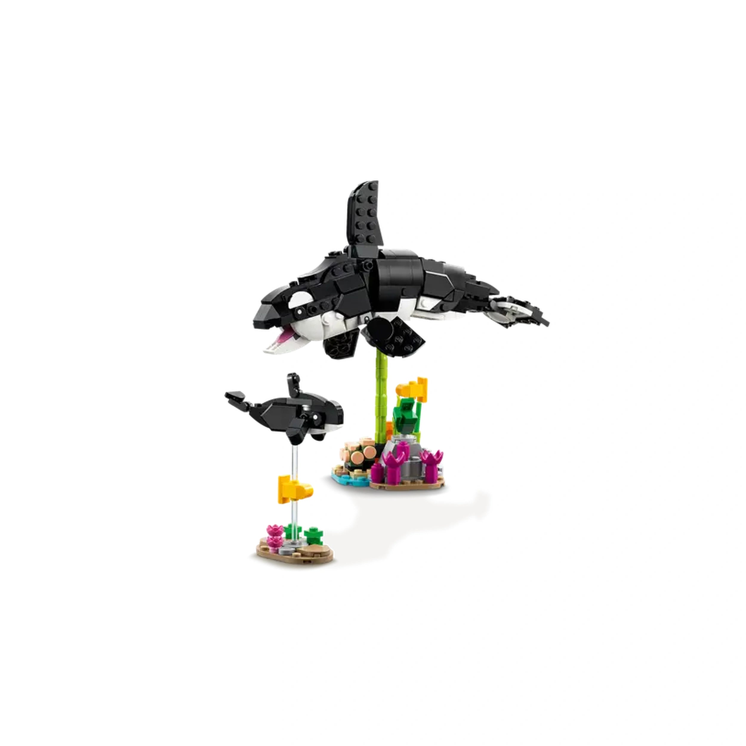 LEGO Creator panda family construction set featuring a large black and white orca and its calf, surrounded by colorful coral and leaves.