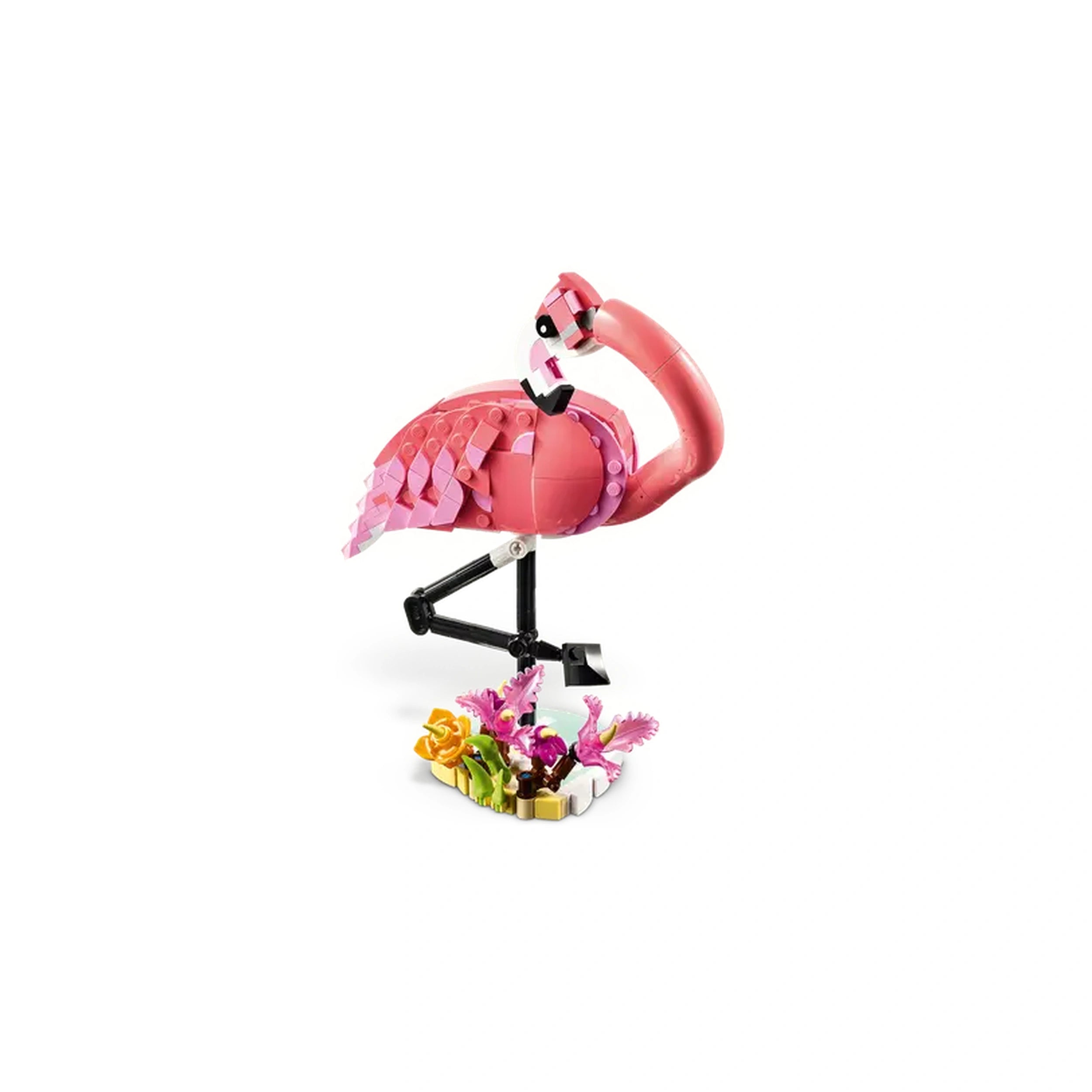 A vibrant pink LEGO flamingo stands on one leg atop a colorful base of flowers and plants, showcasing posable features for imaginative play.