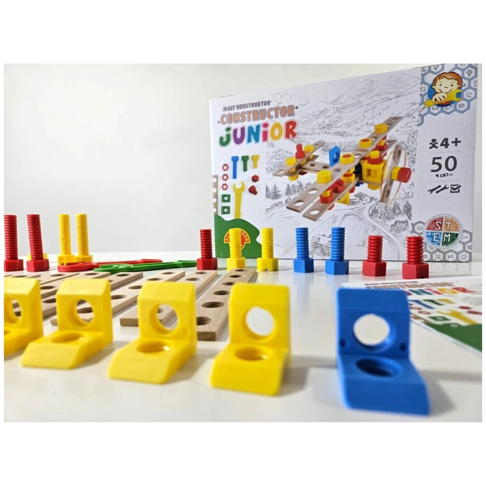 Colorful wooden airplane construction set with yellow and blue brackets, red and yellow screws, and box displaying assembly.